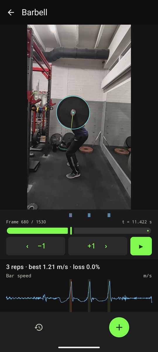 The barbell screen following the plate through a squat